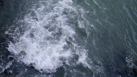 Water in the river forms an eddy with ripples and whirlpools Stock Footage 170031031