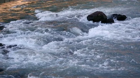 Water in the river forms an eddy with ripples and whirlpools Stock Footage 171403865