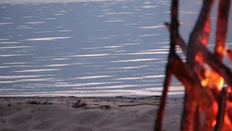 Water in the river at sunset against the background of the fire Stock Footage 80976125