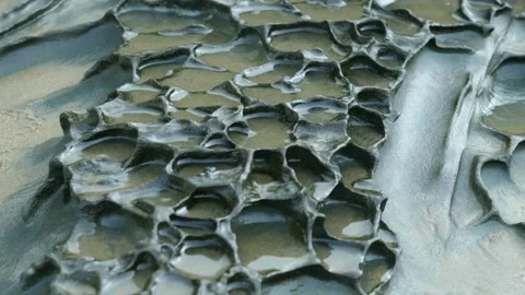 Water in rock formation on beach Stock Footage 260370360