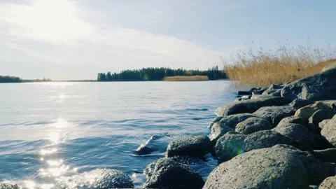 Water on rocks slowly moving - sequence of autumn waves Stock Footage 141716146