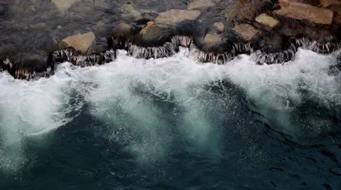 Water Rolls Over Rocks Video stock 30162725