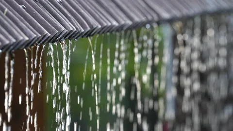 Water run drain close up. Heavy rain pour. Drizzle flow roof. Rainstorm season. Stock Footage 227130903