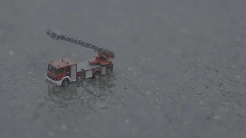 Water Run Off -  Toy Fire Engine - Ungraded - 10Bit CLog2 Vídeo Stock 115670353