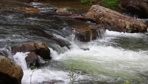 Water runing over rocks Video stock 4517629