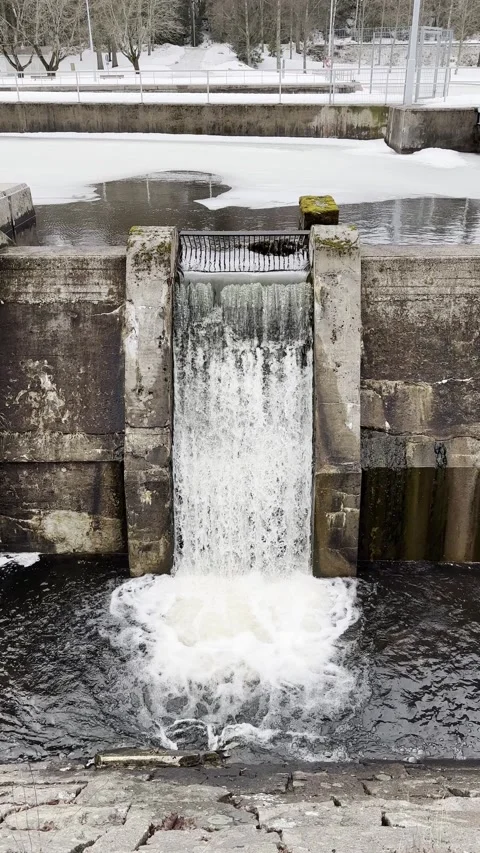 Water running in artificial waterfall, vertical Stock Footage 236898009