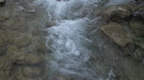 Water Running Between Stones Video stock 63295897