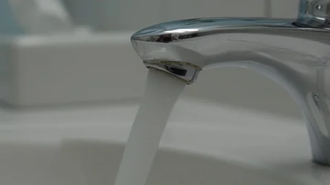 Water running continuously from water tap Stock Footage