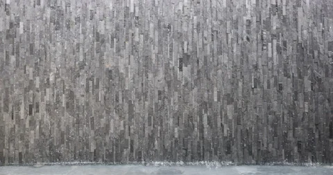 Water running down a large indoor wall. Stock Footage 159752277