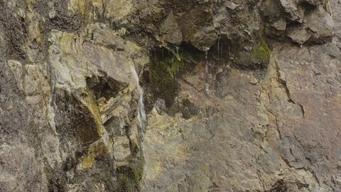 Water running down on a rock Stock Footage 96199546