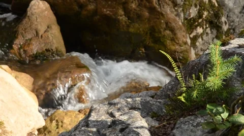 Water running  down rocks Stock Footage 8623693