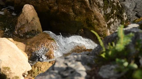 Water running  down rocks Stock Footage 8624014