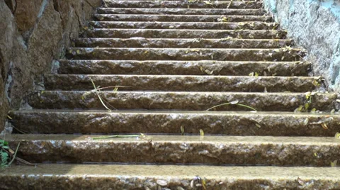 Water running down stone steps Stock Footage 39430836