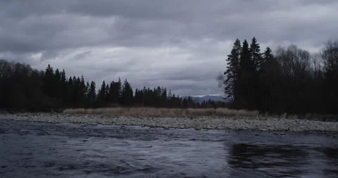Water running fast passing rocks in mountain river. Stock Footage 147633662