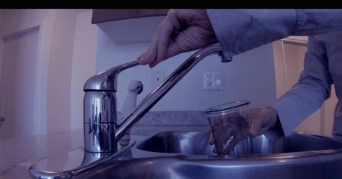 Water running from kitchen tap sink Stock Footage 51559180