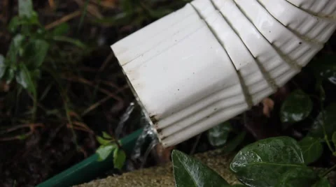 Water running out of a downspout Stock Footage 44444558
