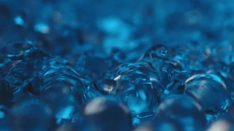 Water running over spheres Stock Footage 165033443
