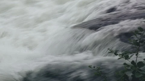 Water running over stone Stock Footage 8642856