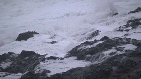 Water Running Off Rocks on the Ocean Stock Footage 88885502