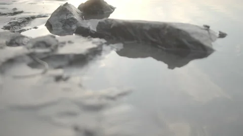 WATER RUNNING UP ON SAND Stock Footage 164810727
