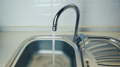 Water Running from the tap. Close-up. Someone close the tap 動画素材 108464733