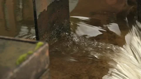 Water running through girder Stock Footage 10688099