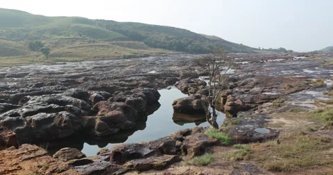 Water running Through mossy rocks Видео 335429167