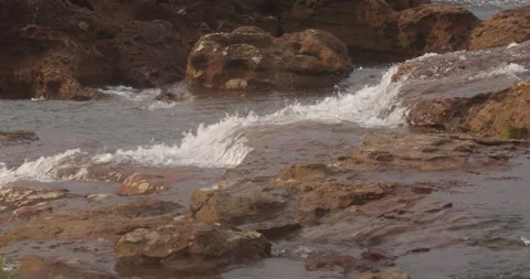 Water running Through mossy rocks Stock Footage 335633940