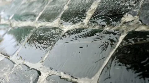 Water running through paving stone Stock Footage 21816352