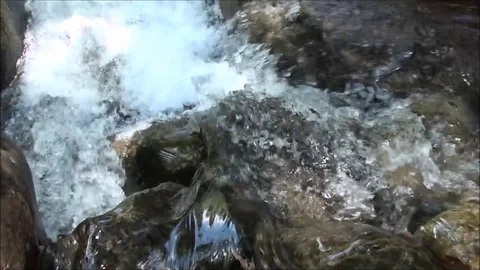 Water running through waterfall rocks Stock Footage 93116247