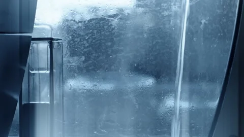 Water runs into the coffee machine, close-up Stock Footage 102597135