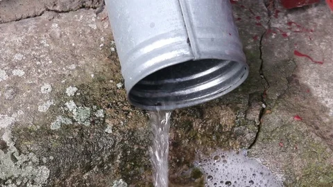 Water Runs Out Of The Gutter 2 Stock Footage 87645124