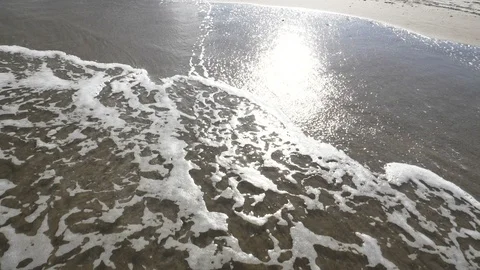 Water Rushing Away From Sun Reflection in Melbourne, FL Video stock 104659705