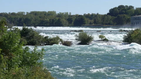 Water rushing down river at Niagara Falls State Park. Stock Footage 155444320
