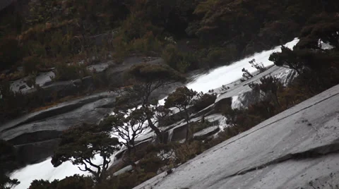 Water rushing down rocks 스톡 동영상 33123804