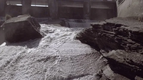  Water rushing down some rocks - Aerial Drone shot - Slow motion Stock Footage 115352751