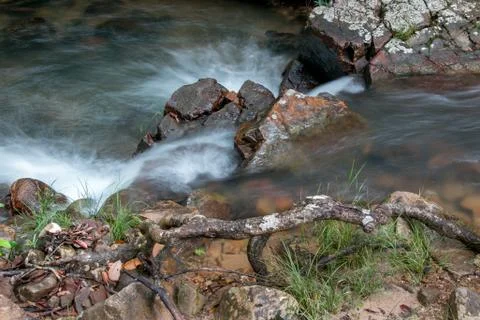 Water Rushing Down a Stream Stock Photos