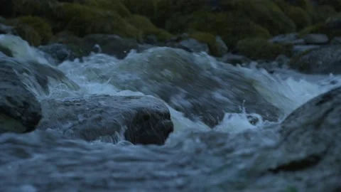 Water rushing into Ocean Stock Footage 165693597