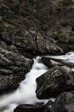 Water rushing through a narrow rock passageway in the Great Smoky Mountains Stock Photos