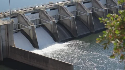 Water Rushing Through Two Open Spillgates at Nimbus Dam Stock Footage 325902155