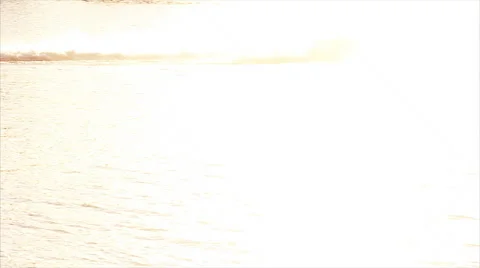 Water scooter pulls men in the circle on the river Stock Footage 67570610