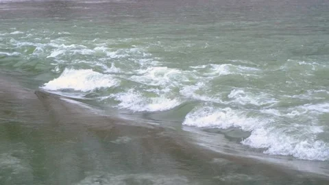 The water is seething on the river rapids. mountain river. Raging mountain river Stock Footage 263149019