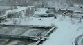 Water sewage treatment plant covered with snow HD Footage