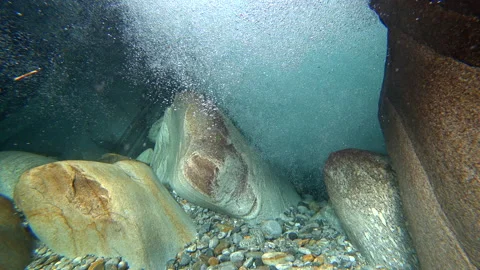 Water sharpens a stone Stock Footage 143426817