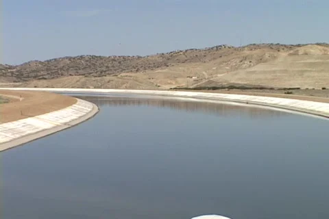 Water from the Sierra Nevada mountains runs through the Los Angeles aqueduct. Stock Footage