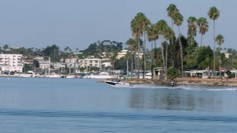 Water Skier Pulled Behind Speedboat in Mission Bay San Diego Stock Footage 81530340