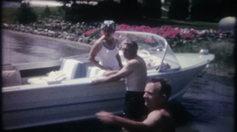Water skiing in one ski at local lake 1950s vintage film home movie 2755 Stock Footage