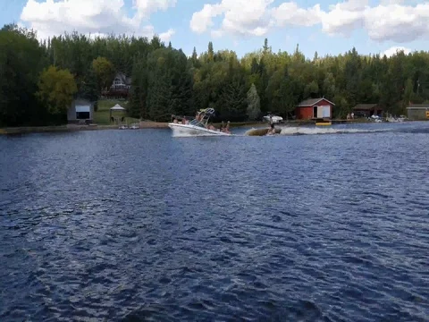 Water Skiing on the River Stock Footage 80165700