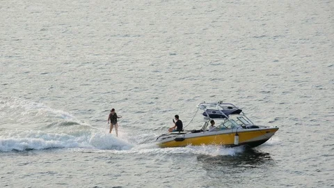 Water skiing on the sea surface Stock Footage 119776846