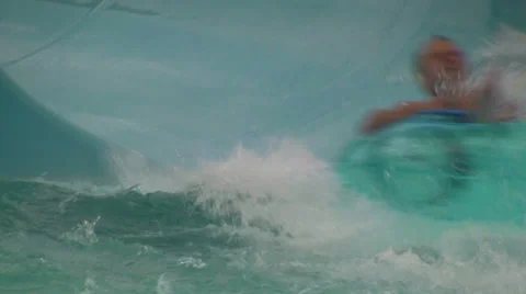 Water Slide Close-up with Final Water Splash Stock Footage 31932547